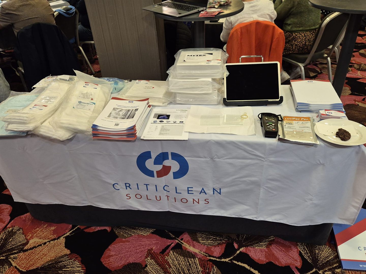 Criticlean Solutions demonstration products displayed for delegates.