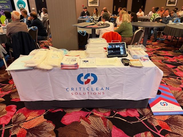 Criticlean Solutions materials on the exhibition table.